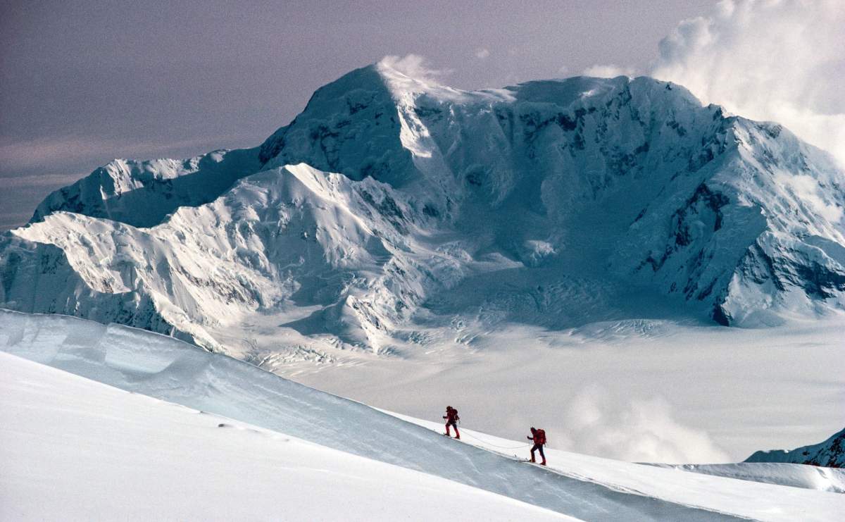 Lisel Currie and Carl Nagy ski roped together on King Trench route of Mt Logan, Mt St Elias in background, Kluane National Park, Yukon in this handout image provided by Pat Morrow.  