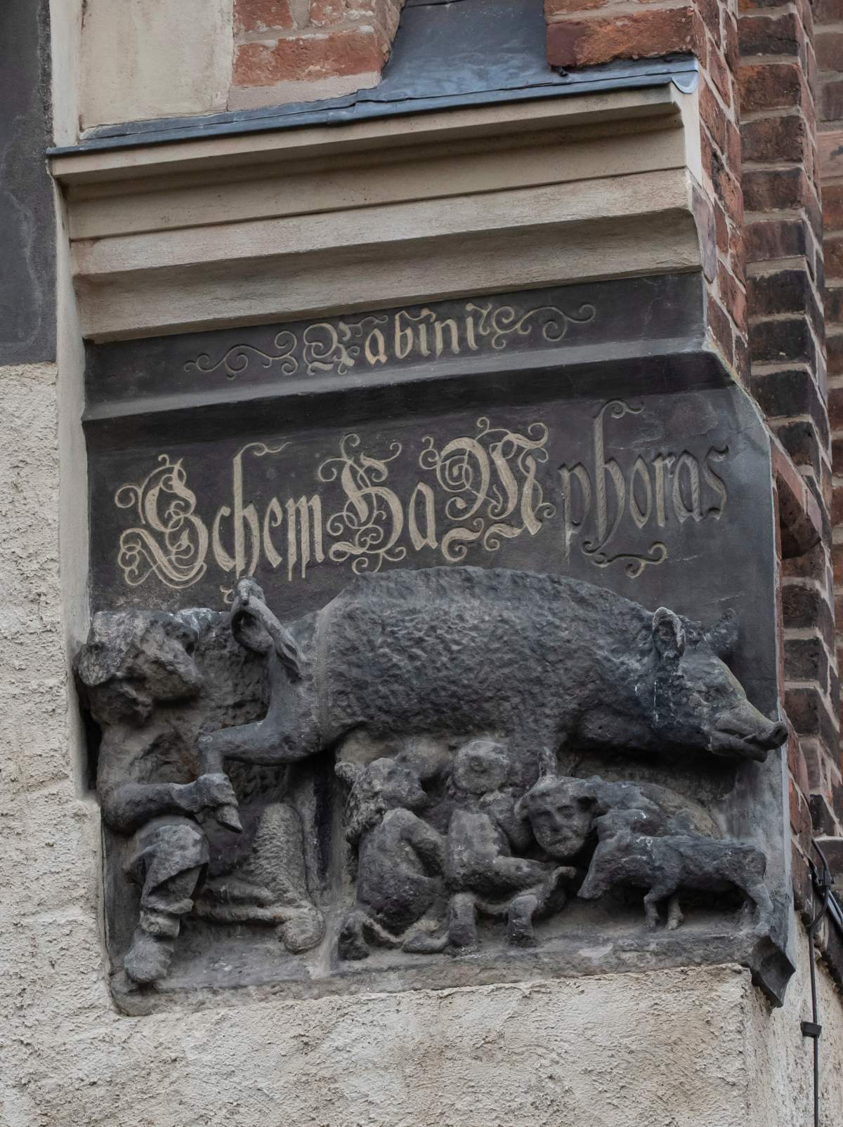 In this Jan. 14, 2020 photo the so-called Judensau, or Jew pig, sculpture is displayed on the facade of the Stadtkirche (Town Church) in Wittenberg, Germany.