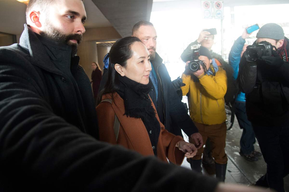 Meng Wanzhou chief financial officer of Huawei leaves B.C. Supreme Court in Vancouver, B.C., Friday, January 17, 2020. 