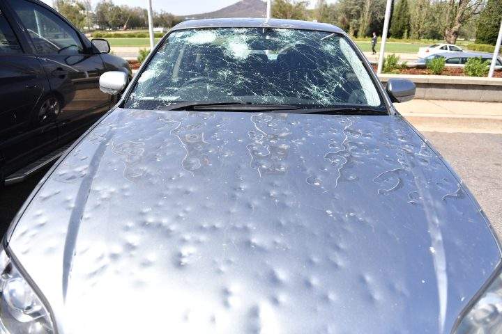 Damaged cars are seen parked outside Old Parliament House after a hailstorm hit Canberra, Australia, Jan. 20, 2020.