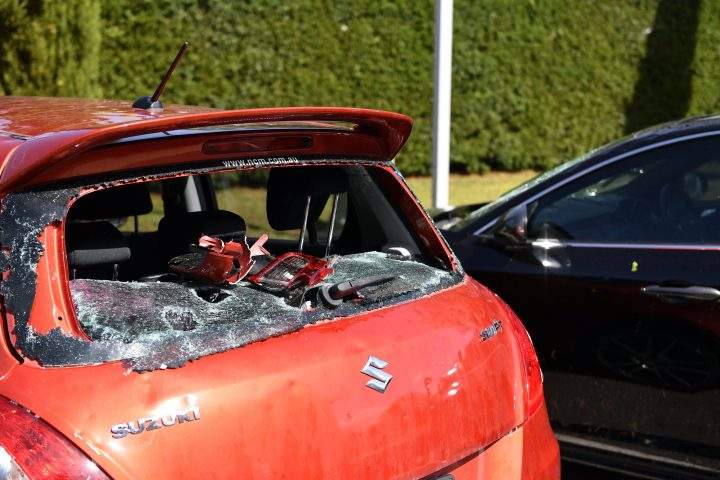 Damaged cars are seen parked outside Old Parliament House after a hailstorm hit Canberra, Australia, Jan. 20, 2020.