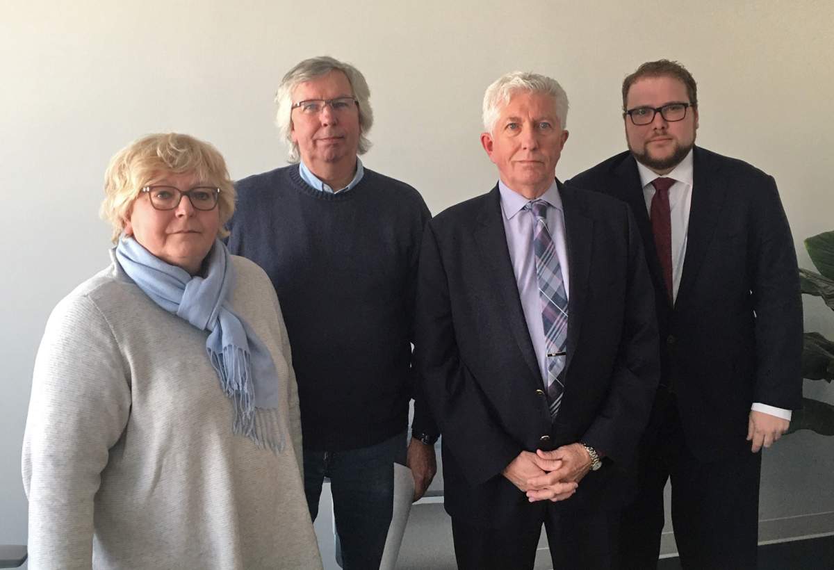 Monique Duceppe, left to right, Yves Duceppe and Gilles Duceppe pose for a photo with their lawyer Marc-Antoine Cloutier in Brossard, Que. on Monday, January 20, 2020. Helene Rowley Hotte Duceppe's seven children are suing the home where she died of hypothermia for $1.25 million.