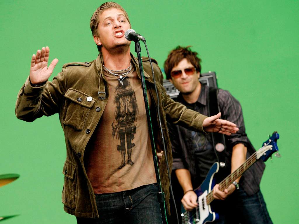 Rob Thomas, left, and Brian Yale of the band Matchbox Twenty perform during a video shoot in Los Angeles in this Aug. 8, 2007, file photo.
