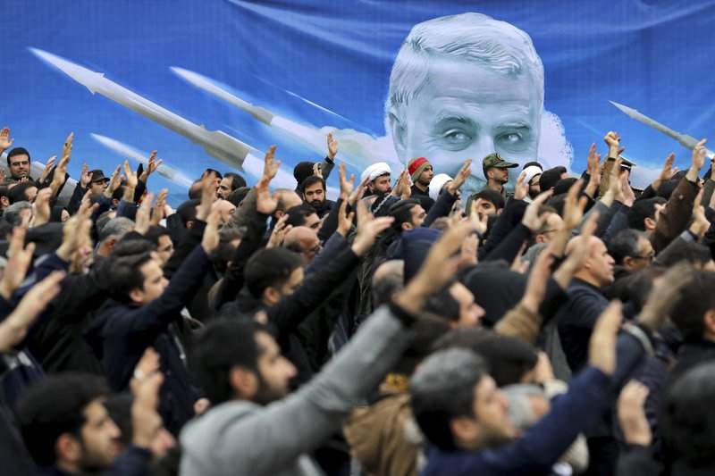 Protesters demonstrate over the U.S. airstrike in Iraq that killed Iranian Revolutionary Guard Gen. Qassem Soleimani in Tehran, Iran, Saturday Jan. 4, 2020.