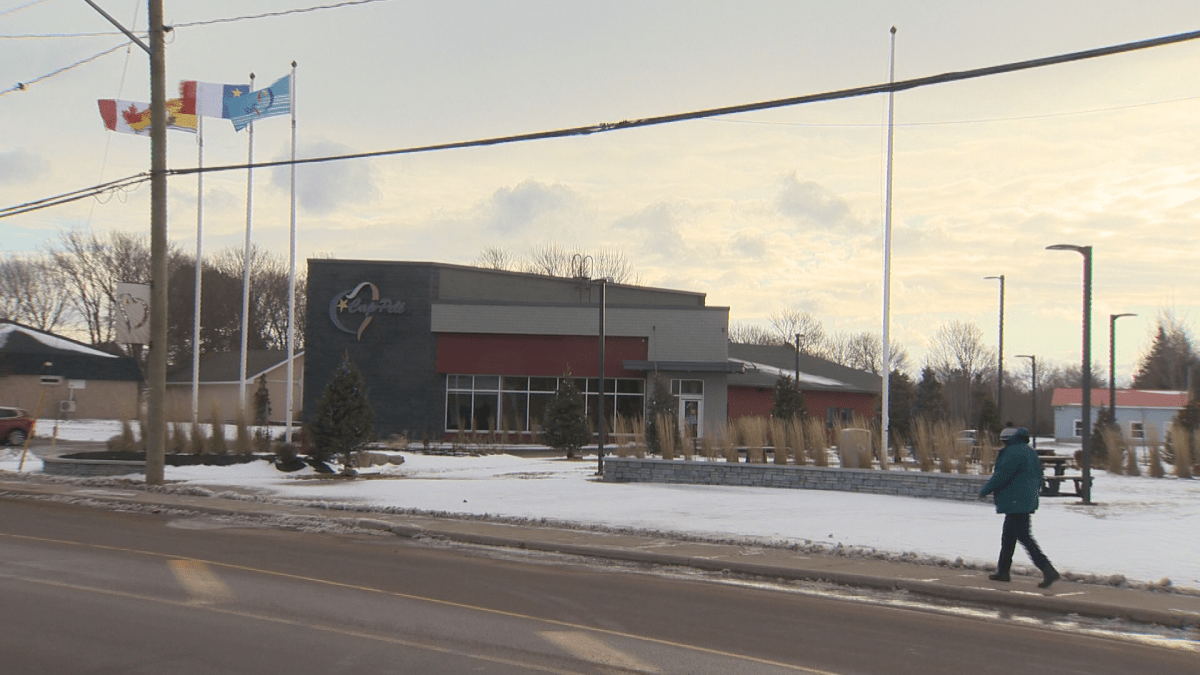 A person walks by the Cap-Pelé municipal building on Jan. 2, 2020.