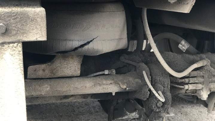 Evan Grant claims Unifor picketers have blown one of his truck’s air bag.