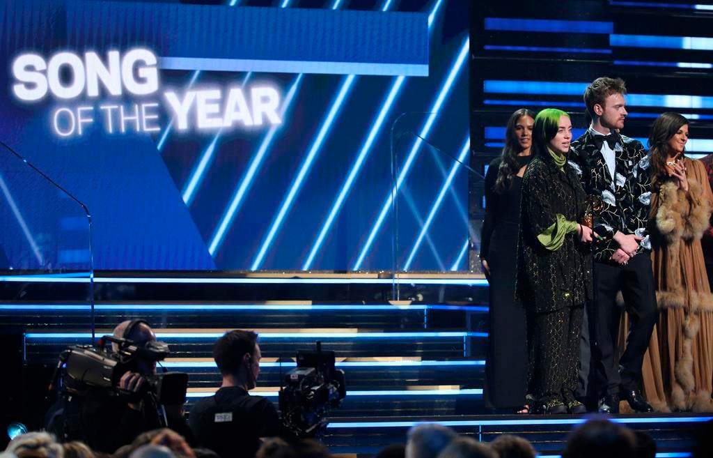 Billie Eilish, left, and Finneas O’Connell accept the award for song of the year for “Bad Guy” at the 62nd annual Grammy Awards on Sunday. (Photo by Matt Sayles/Invision/AP)