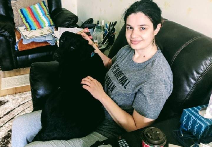 Delia Marinceu and Oscar are seen in a photo.