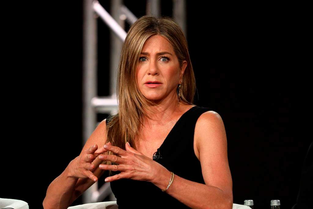 Jennifer Aniston speaks at “The Morning Show,” panel during the Apple+ TCA 2020 Winter Press Tour at the Langham Huntington, Sunday, Jan. 19, 2020, in Pasadena, Calif. (Photo by Willy Sanjuan/Invision/AP)