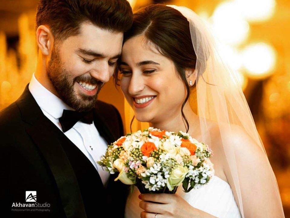 Arash Pourzarabi and his wife, Pooneh Gorji appear in their recent wedding photo.