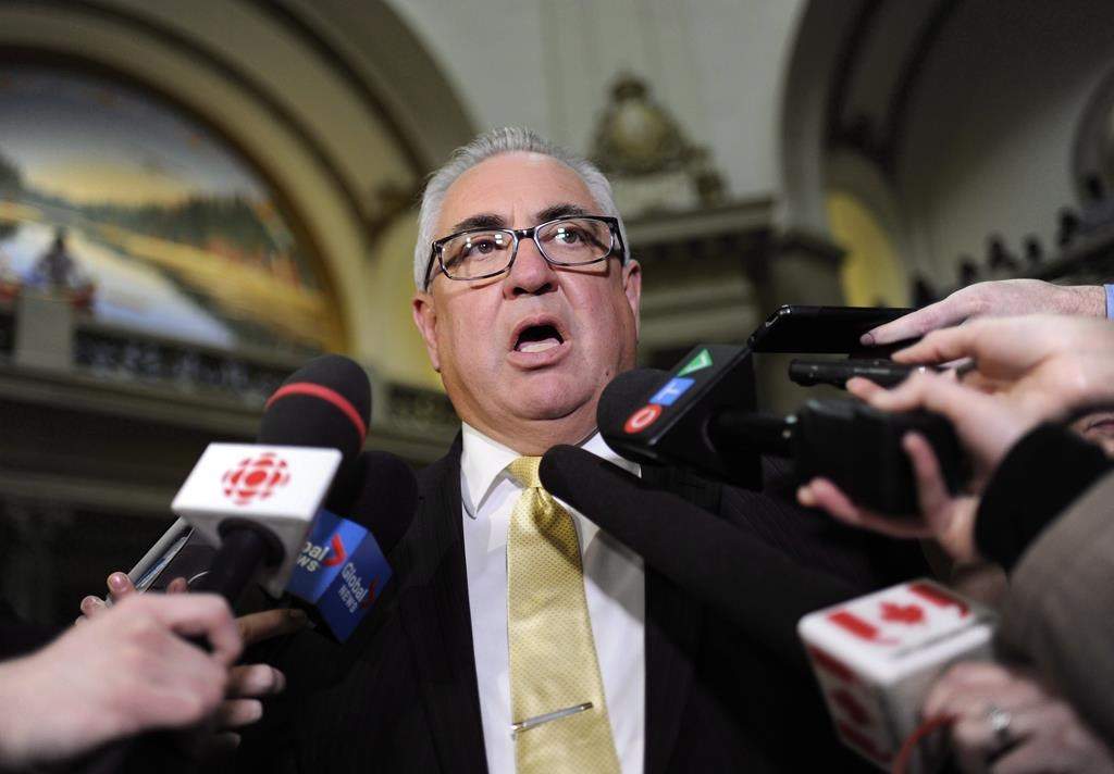 Crown Investment Corporation Minister Joe Hargrave speaks to reporters at the Saskatchewan Legislature on Oct. 25, 2017. 