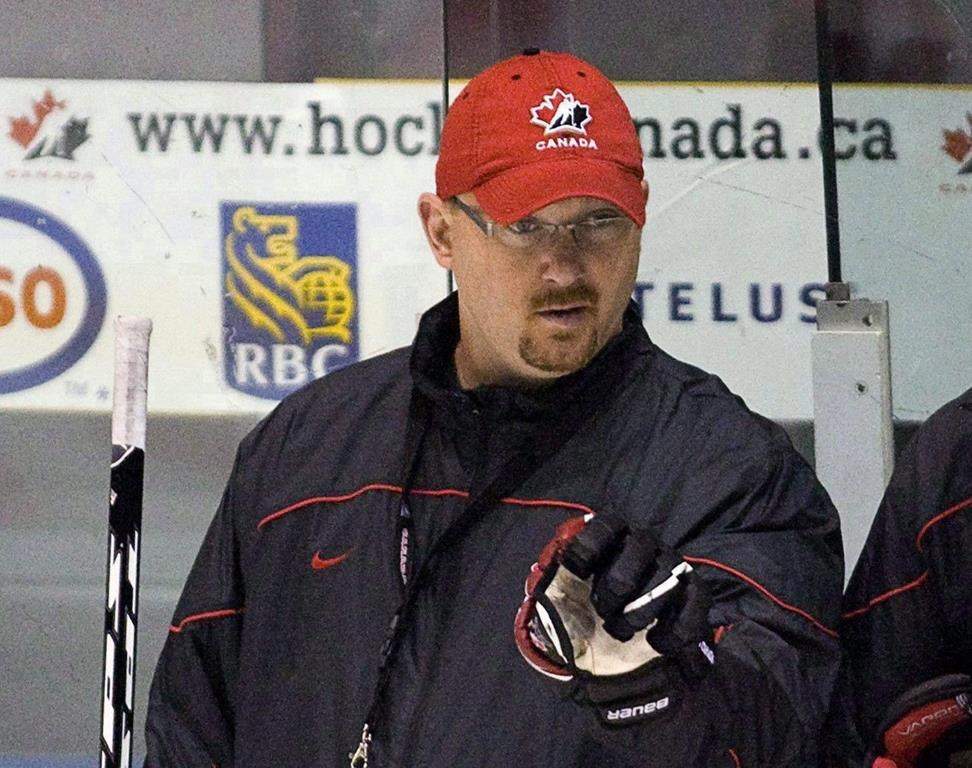 Assistant coach André Tourigny follows the action during practice at the national junior hockey team development camp in St. John’s, N.L. on Friday, Aug. 6, 2010.