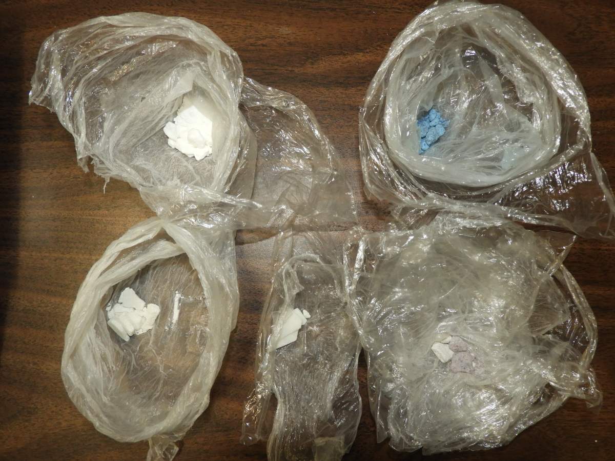Peterborough police say officers seized drugs and arrested five people following a search of a residence on Hunter Street on Tuesday.