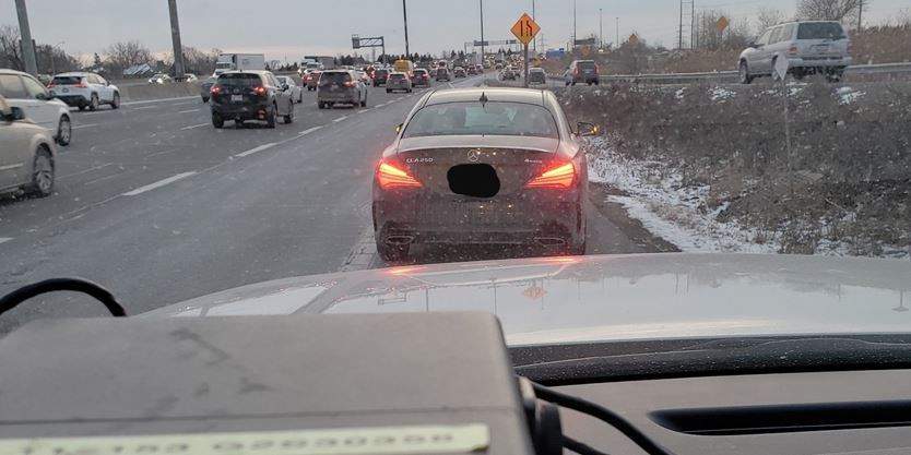 OPP says texting driver was "oblivious" to officer walking toward them .