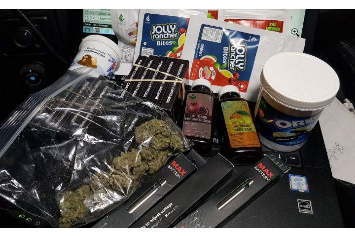 The driver was charged with having cannabis readily available after cannabis oil, flowers and edibles appeared readily accessible to the drive, police say.
