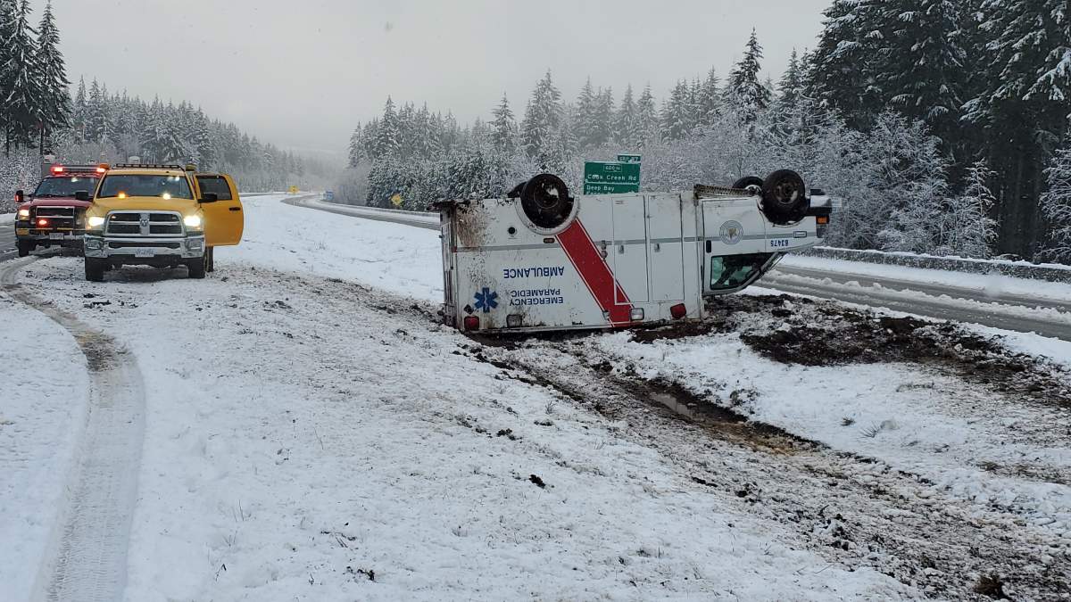 A rolled ambulance is pictured on the Island Highway near Union Bay, Friday. BC EHS said no patients were aboard and the crew was not seriously hurt.