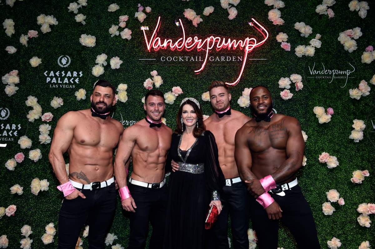 LAS VEGAS, NEVADA – MARCH 30: Television personality Lisa Vanderpump (C) and Chippendales dancers attend the grand opening of Vanderpump Cocktail Garden at Caesars Palace on March 30, 2019, in Las Vegas, Nevada. (Photo by David Becker/Getty Images)