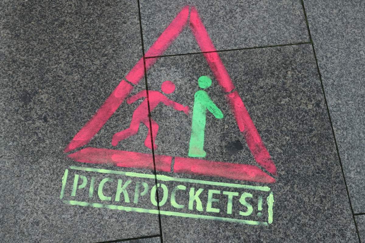 A painted sign on the sidewalk warns of pickpockets near Hauptbahnhof main railway station on Dec. 14, 2016 in Berlin, Germany.
