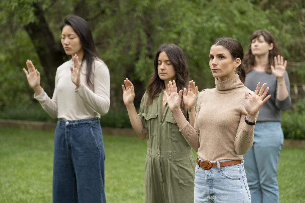 Members of the goop team working with medium Laura Lynne Jackson. Photo courtesy of Adam Rose/Netflix