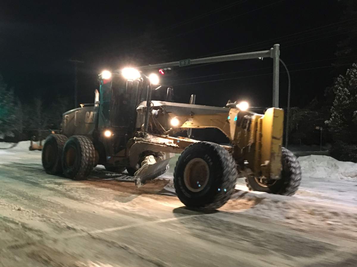 A grader clearing snow on 111 Street near 34 Avenue in south Edmonton on Thursday, January 23, 2020.