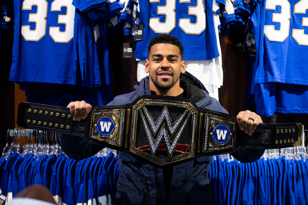 Winnipeg Blue Bombers' Andrew Harris with his 'championship belt.'.