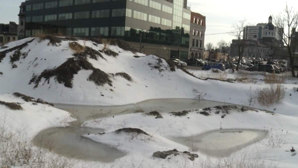 The two high rises proposed for lower Queen Street have been used as surface parking lots, but one site remains in a partially excavated state.