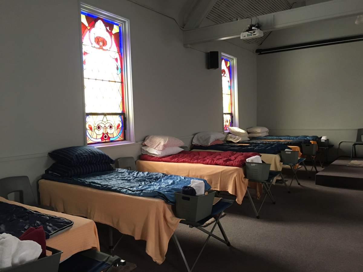 Beds line the inside of Beth Emmanuel Church in London’s SoHo neighbourhood.