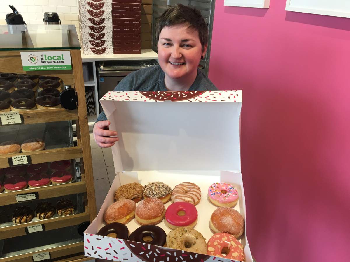Oh Doughnuts owner Amanda Kinden shows off some of her wares Tuesday afternoon.
