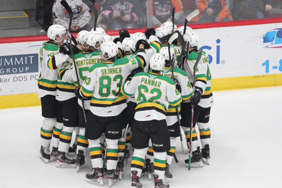 Flint, Mich. - The London Knights swarm Luke Evangelista after his goal gave London a 4-3 win in overtime over the Flint Firebirds on January 4, 2020.