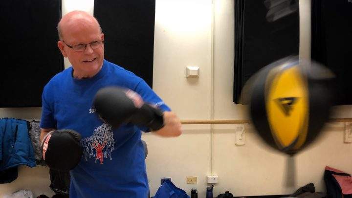 Darwin Mott throws punches during a Rock Steady Boxing class on Jan. 15, 2020.