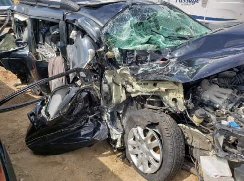 The family\’s mini-van after the crash.
