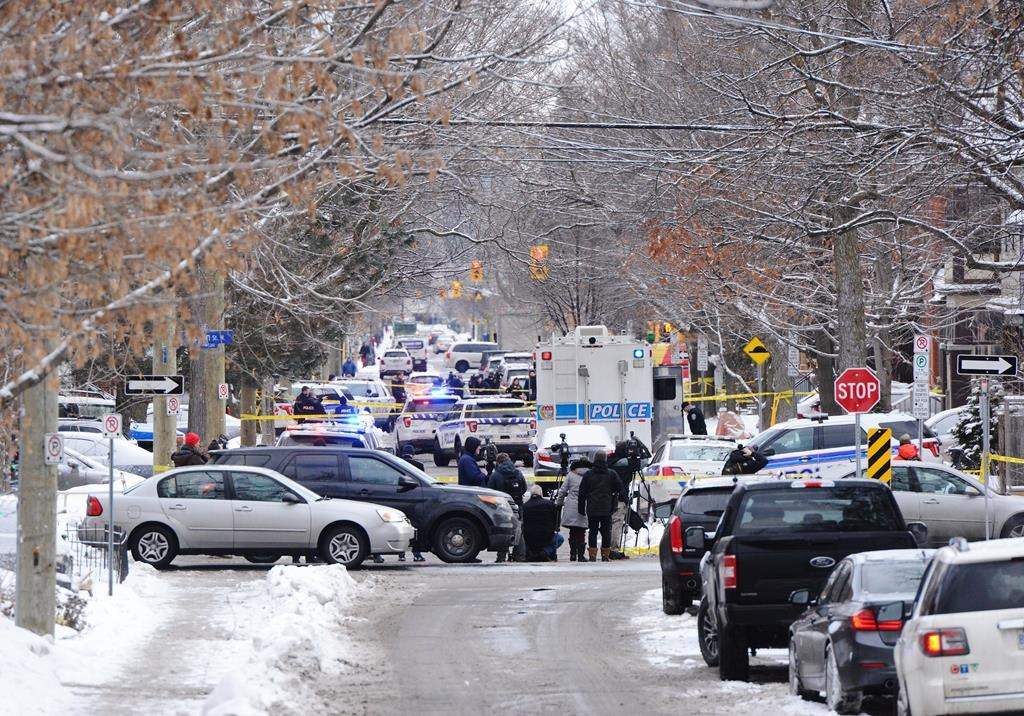 Police inspect the scene of a shooting in downtown Ottawa on Wednesday, January 8, 2020.