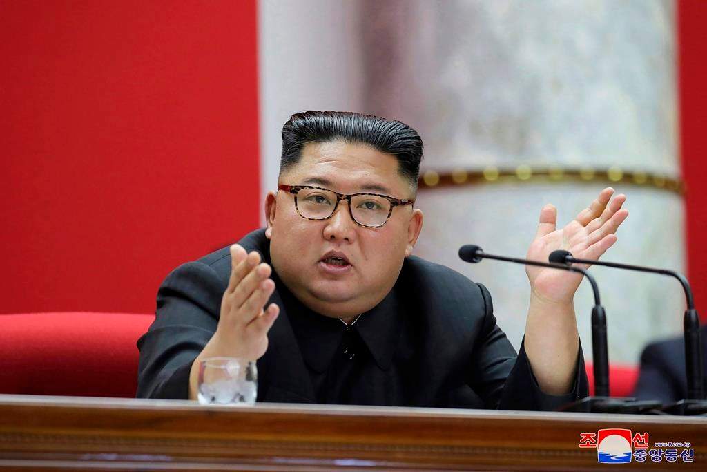 In this undated photo taken during the period of Dec. 28 - Dec. 31, 2019 provided by the North Korean government, North Korean leader Kim Jong Un attends a Workers’ Party meeting in Pyongyang, North Korea.