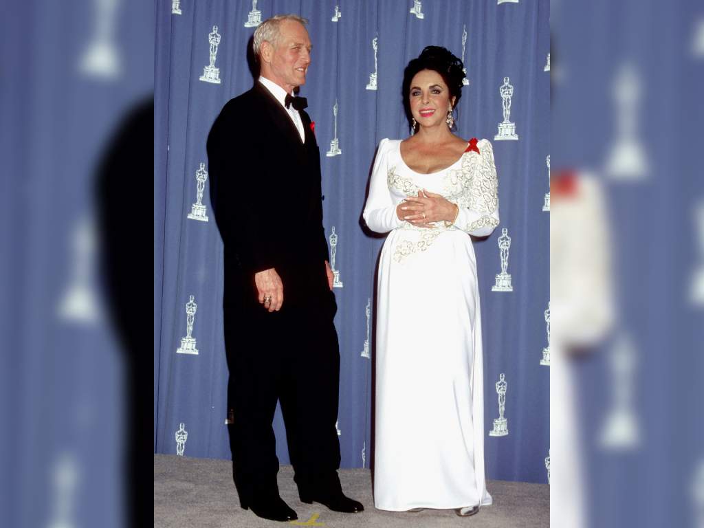 Paul Newman and Elizabeth Taylor pose during the 64th Annual Academy Awards.