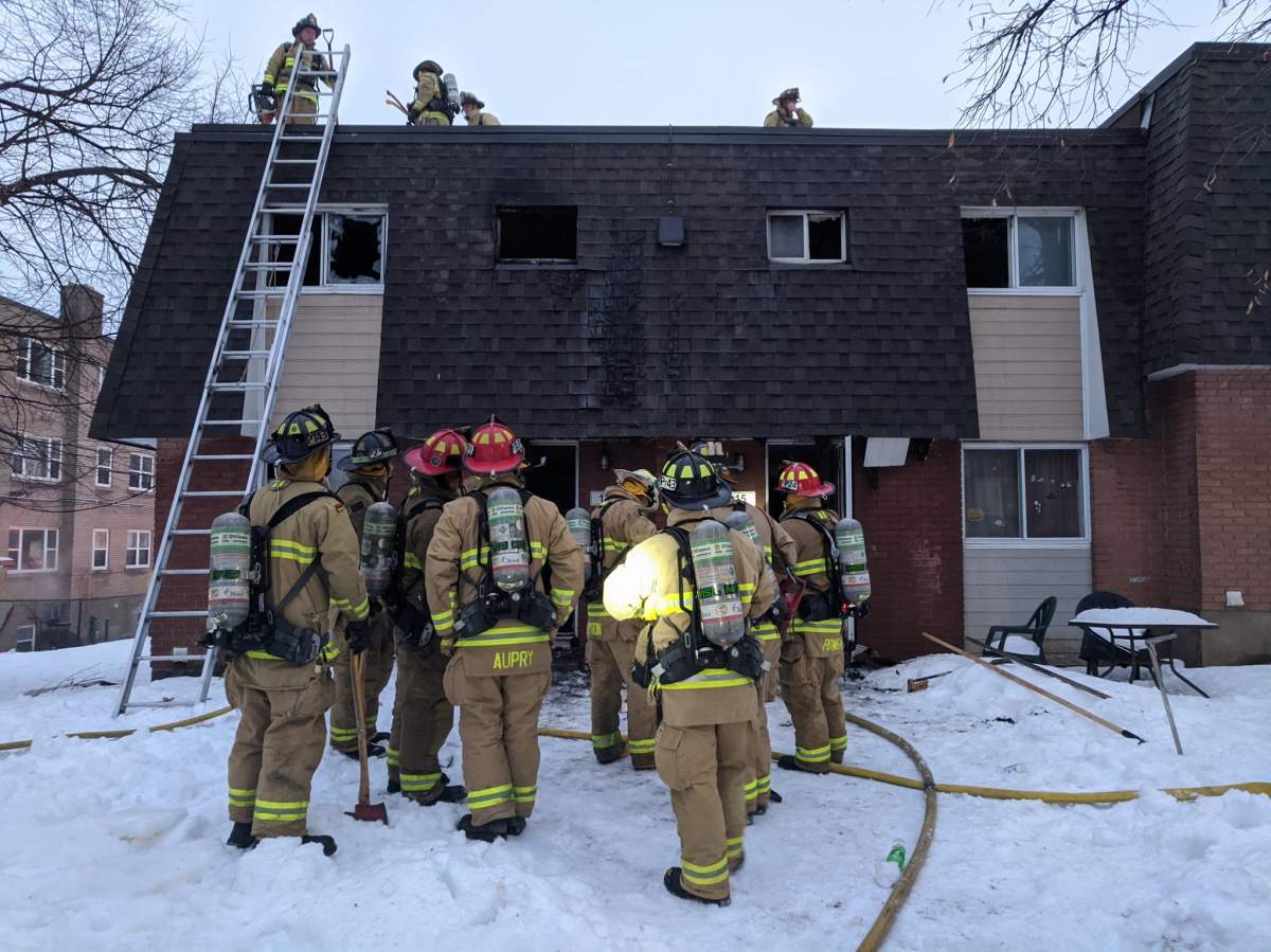 Ottawa firefighters tackle a blaze at 1100 Medford St. on Tuesday morning. Seven people have been displaced from two units because of the fire.