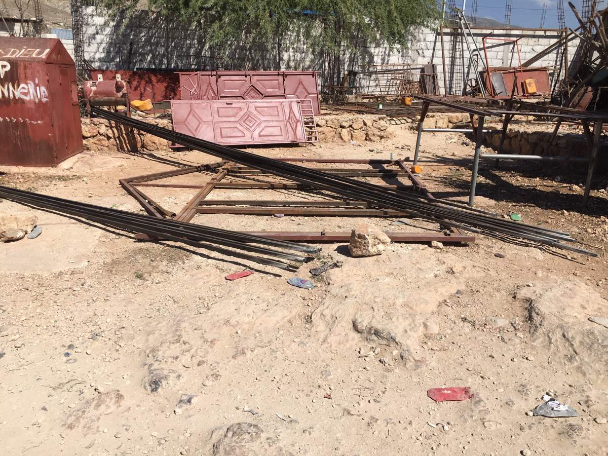 Remoncial’s open-air metal shop in Canaan, Haiti.