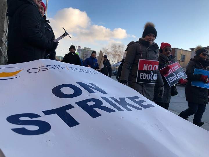 Ontario’s high school teachers and educational workers from eight school boards on strike for one day. Picketers strike in Mississauga.