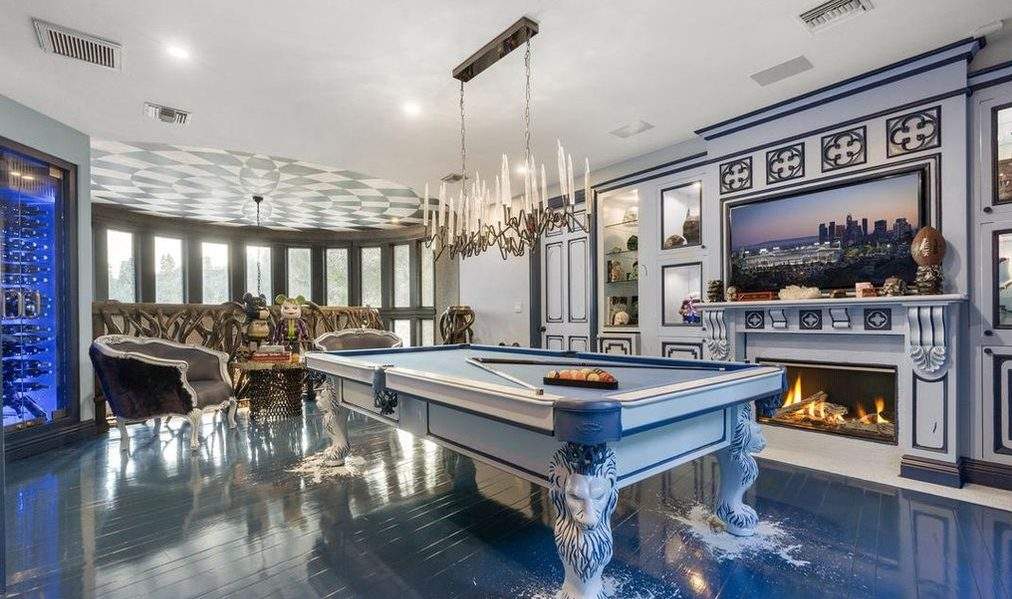 A recreation room is shown in this image from a real estate listing.