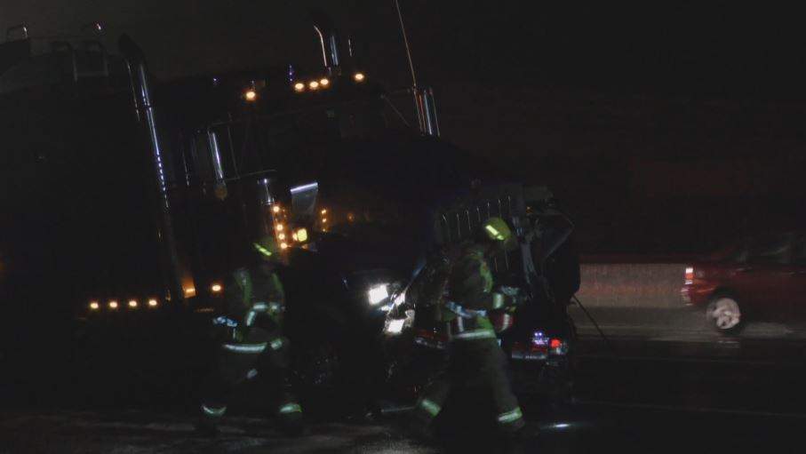 Firefighters respond to a two-vehicle collision on the Queen Elizabeth Way in Beamsville Saturday night.