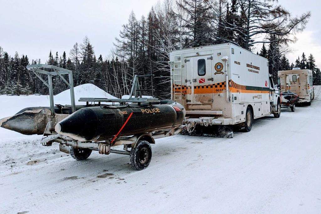 Quebec provincial police vehicles are seen in St-Henri-de-Taillon, Que. on Wednesday, January 22, 2020.