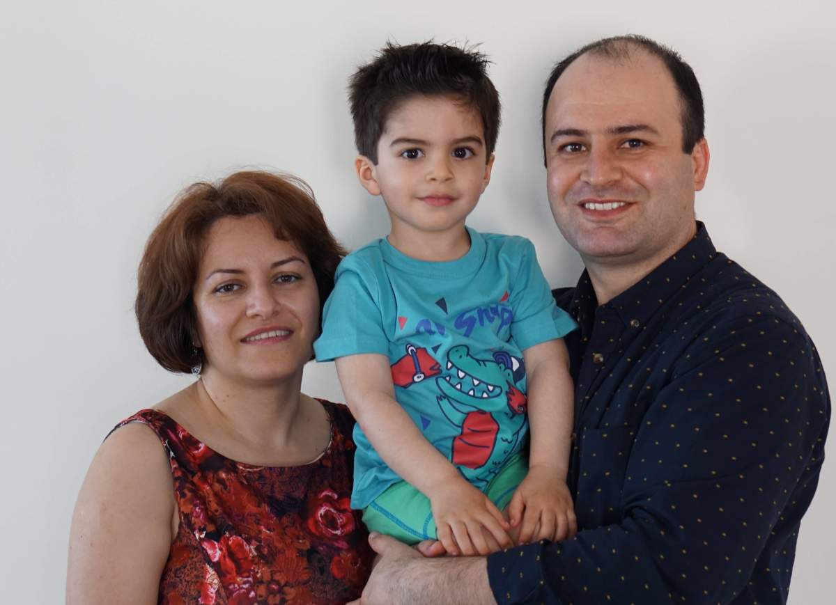 Farideh Gholami picture with her three-year-old son Jiwan Rahimi and husband Razgar Rahimi.