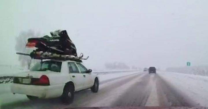 Police are hoping to speak to the driver of this vehicle to verify whether their "questionable" sled transportation method is safe. 