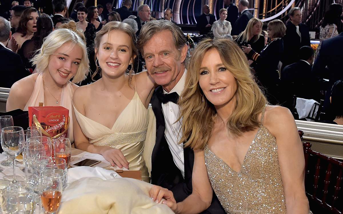 (L-R) Sofia Grace Macy, Georgia Grace Macy, William H. Macy and Felicity Huffman attend FIJI Water at the 76th annual Golden Globe Awards on Jan. 6, 2019 at the Beverly Hilton in Los Angeles, Calif.