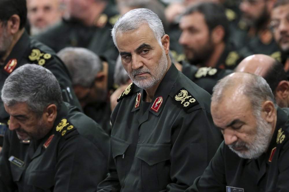 In this Sept. 18, 2016, file photo provided by an official website of the office of the Iranian supreme leader, Revolutionary Guard Gen. Qassem Soleimani, centre, attends a meeting in Tehran, Iran. (Office of the Iranian Supreme Leader via AP, File)