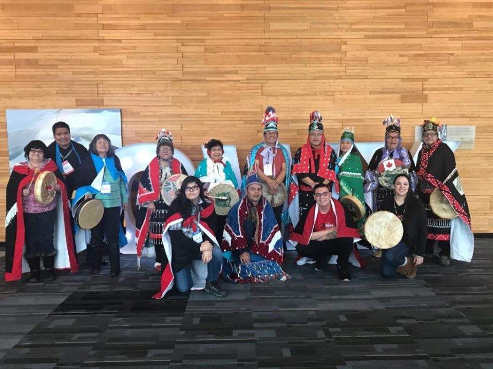 Members of the Babine Lake Nation pose in their regalia at the Vancouver Convention Centre. 
