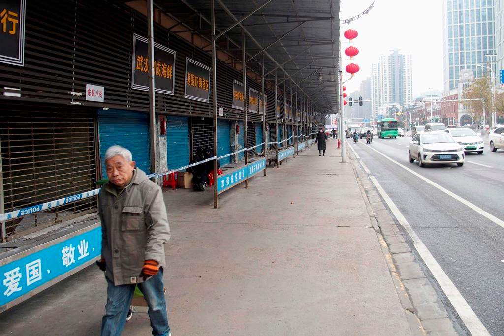 This Jan. 17, 2020, photo, shows the closed Huanan Seafood Wholesale Market in Wuhan, China. (Kyodo News via AP).