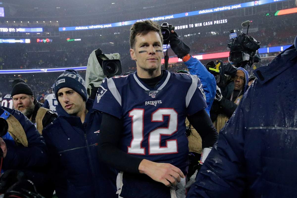 New England Patriots quarterback Tom Brady leaves the field after losing an NFL wild-card playoff football game to the Tennessee Titans, Saturday, Jan. 4, 2020, in Foxborough, Mass.