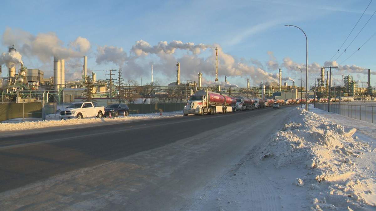 A long line of Co-op fuel trucks waits outside the refinery due to a Unifor blockade on Jan. 20, 2019.