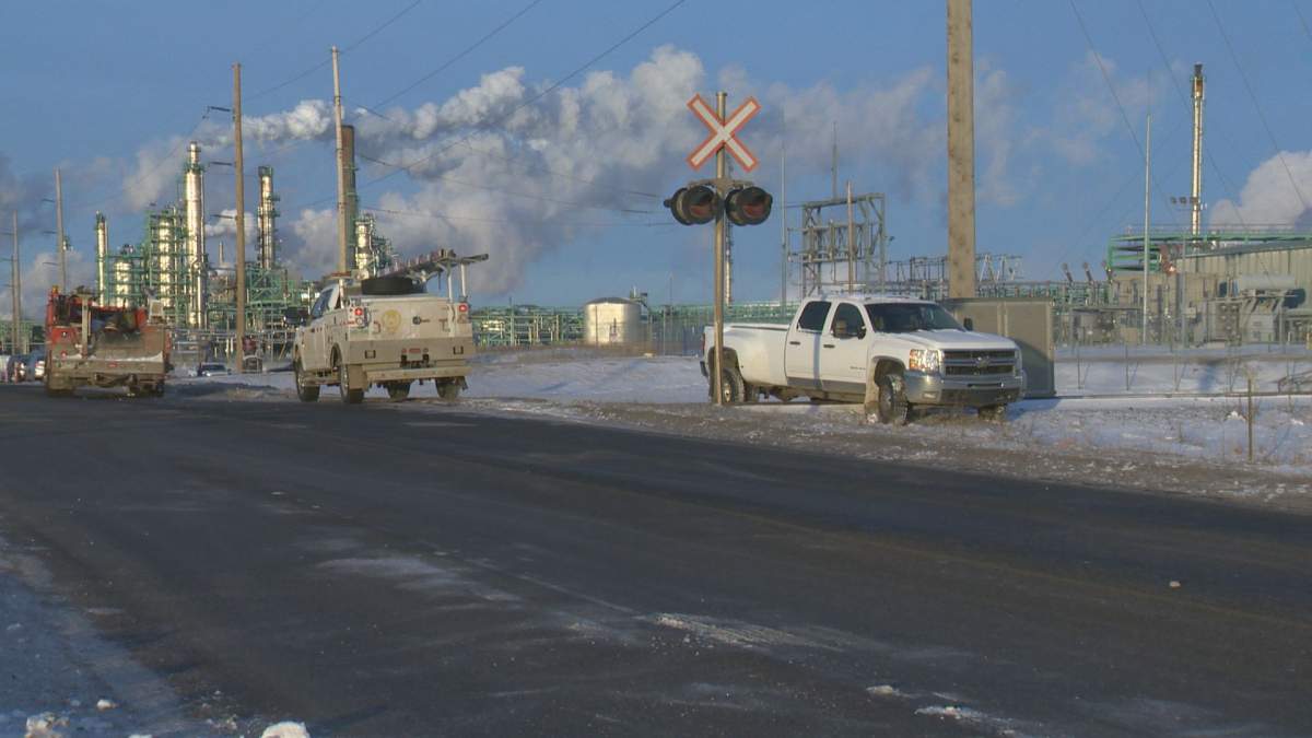 A truck sits on the train tracks near the Co-op Refinery as Unifor blocks all traffic in and out of the complex on Jan. 20, 2019.