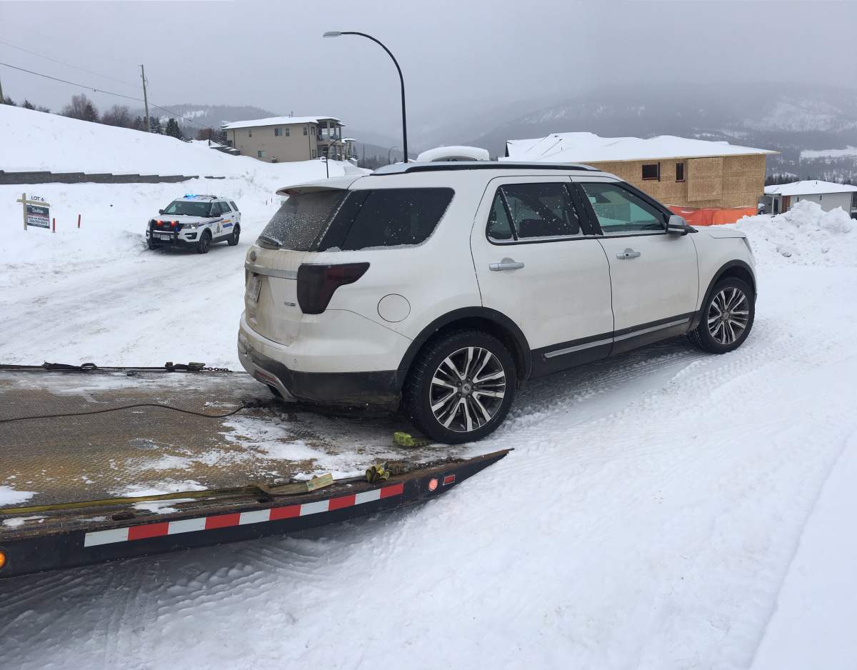 Police towed a white SUV away from the Goldie Way area on Tuesday.